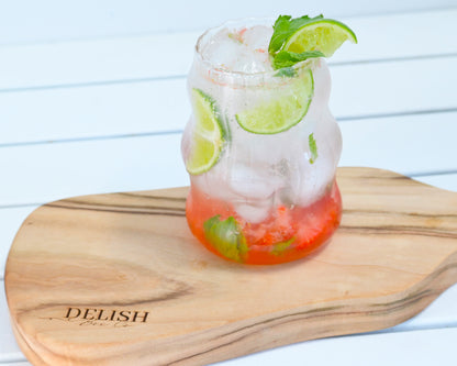 Mojito Cocktail Resting on Engraved Timber Serving Board